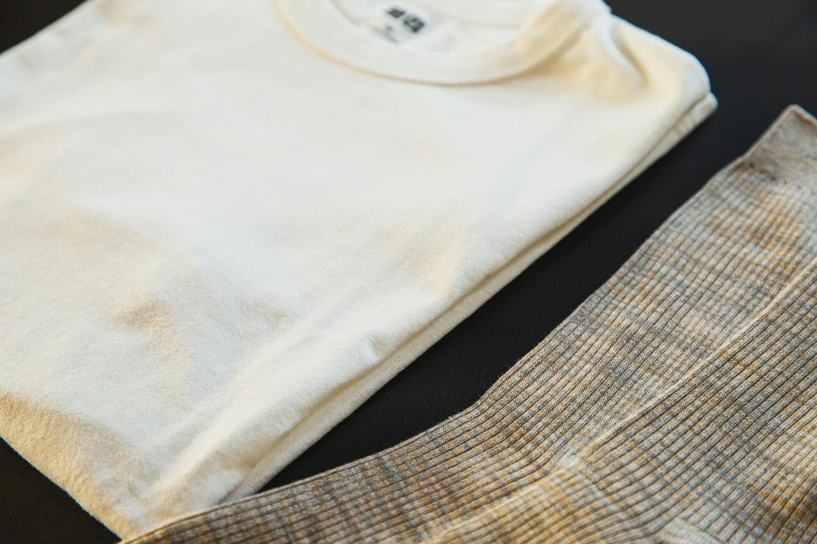 Folded premium men's t-shirt in flat lay style
