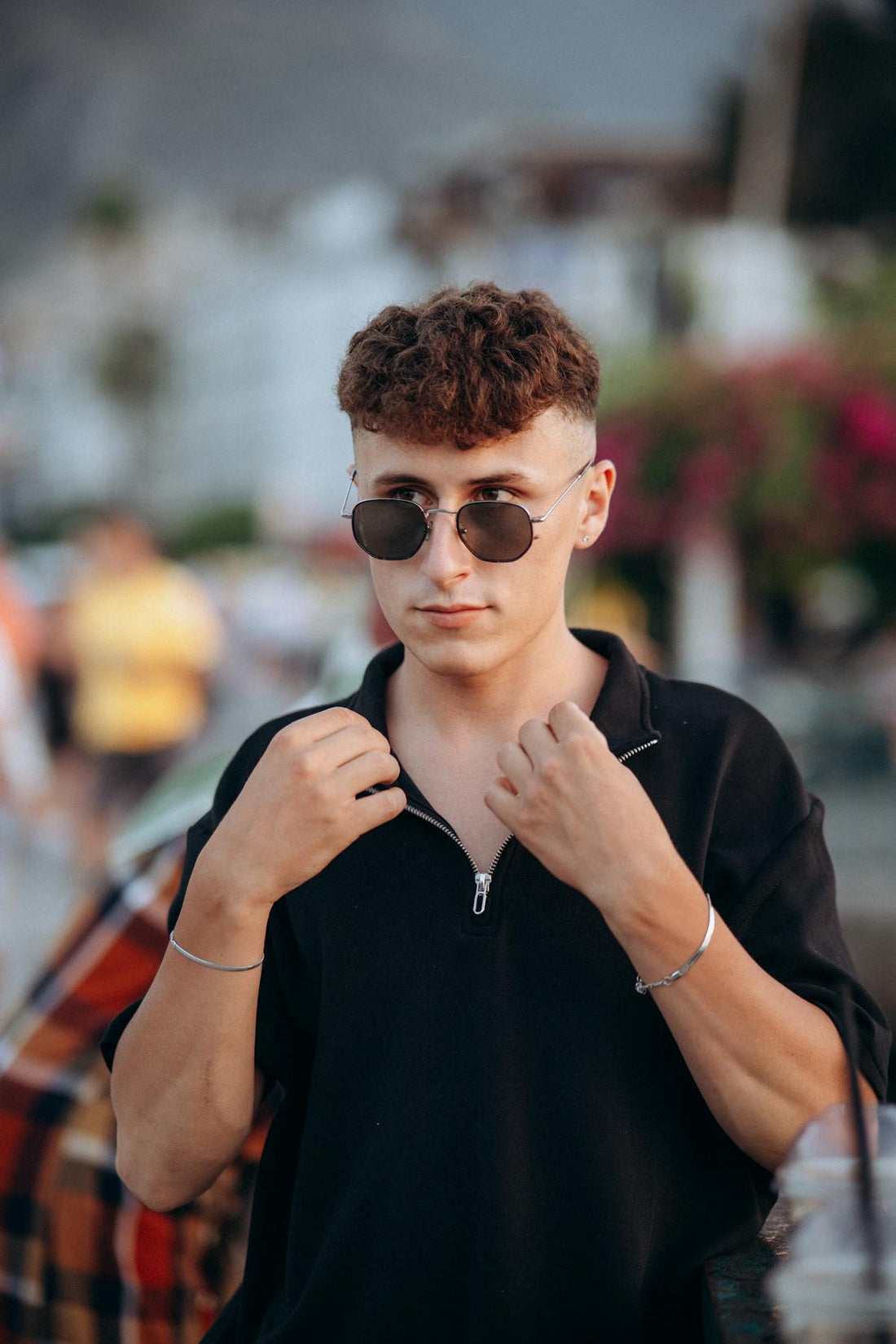 Man in clean summer outfit on a sunlit street