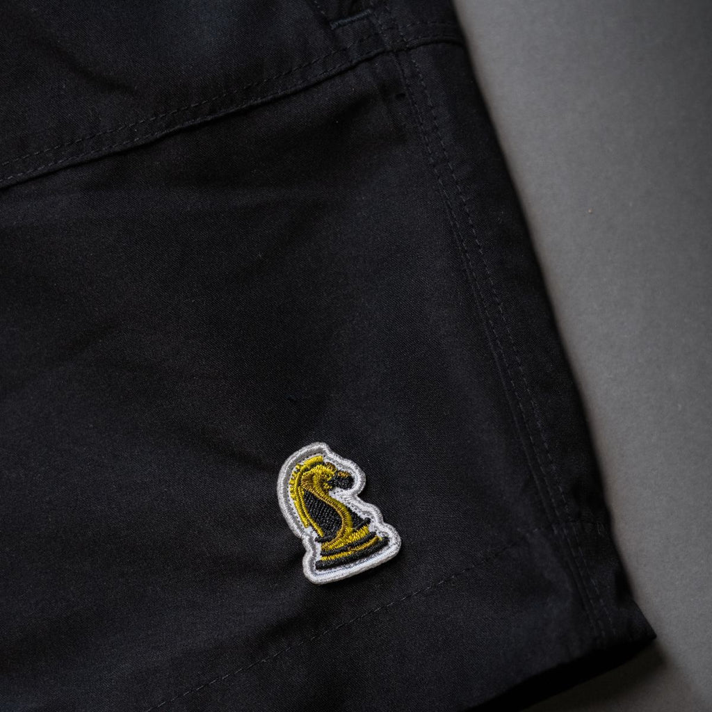 Black Shorts on Backdrop closeup