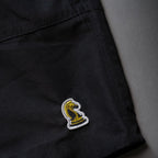 Black Shorts on Backdrop closeup