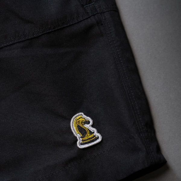 Black Shorts on Backdrop closeup