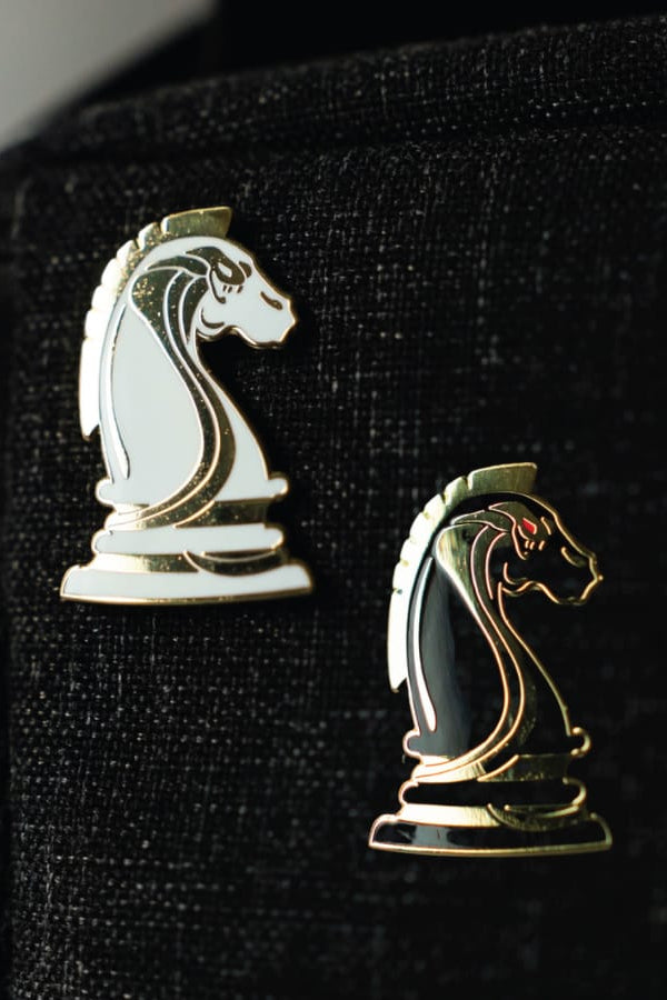 White and Black Pin Badges
