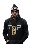 TOP G BOBBLE HAT front view Top G beanie